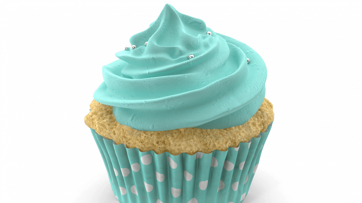 White cupcake with blue icing and wrapper